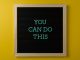 Inspirational message 'You Can Do This' displayed on a blackboard with a bold yellow backdrop.